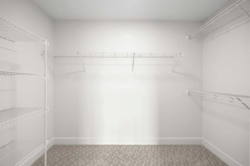 302-67 Panatella Square Nw, Calgary, AB - Indoor With Storage