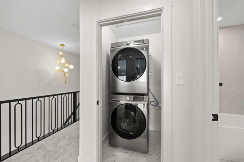 302-67 Panatella Square Nw, Calgary, AB - Indoor Photo Showing Laundry Room