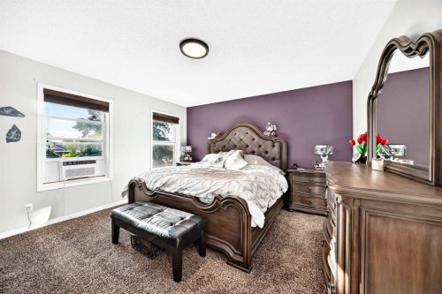 265 Bridleridge View Sw, Calgary, AB - Indoor Photo Showing Bedroom