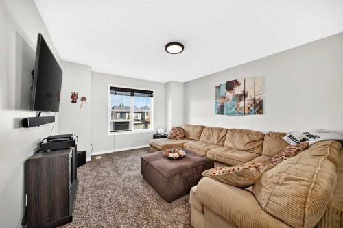 265 Bridleridge View Sw, Calgary, AB - Indoor Photo Showing Living Room