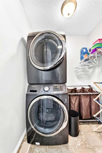 265 Bridleridge View Sw, Calgary, AB - Indoor Photo Showing Laundry Room