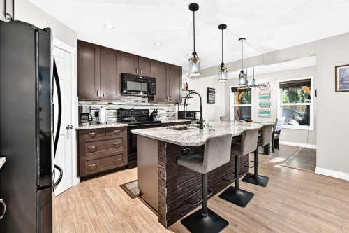 265 Bridleridge View Sw, Calgary, AB - Indoor Photo Showing Kitchen With Upgraded Kitchen