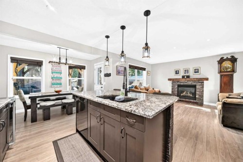 265 Bridleridge View Sw, Calgary, AB - Indoor Photo Showing Other Room With Fireplace
