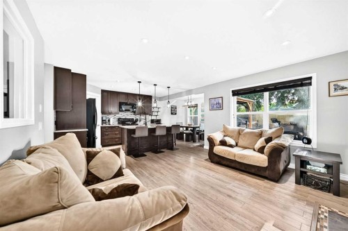 265 Bridleridge View Sw, Calgary, AB - Indoor Photo Showing Living Room