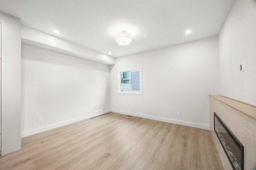 305-67 Panatella Square Nw, Calgary, AB - Indoor Photo Showing Other Room