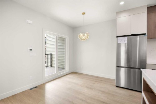 305-67 Panatella Square Nw, Calgary, AB - Indoor Photo Showing Other Room