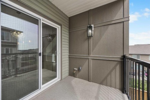 305-67 Panatella Square Nw, Calgary, AB - Outdoor With Balcony With Exterior
