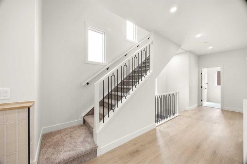 305-67 Panatella Square Nw, Calgary, AB - Indoor Photo Showing Other Room