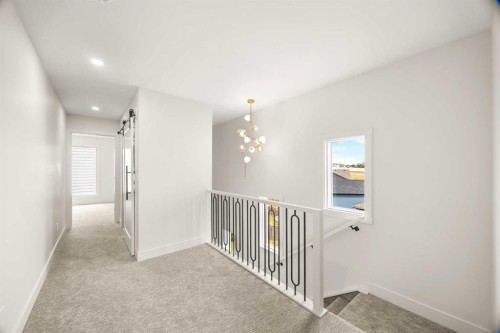 305-67 Panatella Square Nw, Calgary, AB - Indoor Photo Showing Other Room