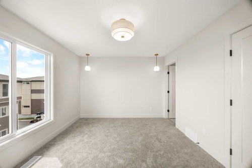 305-67 Panatella Square Nw, Calgary, AB - Indoor Photo Showing Other Room