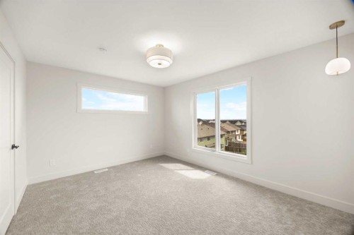 305-67 Panatella Square Nw, Calgary, AB - Indoor Photo Showing Other Room