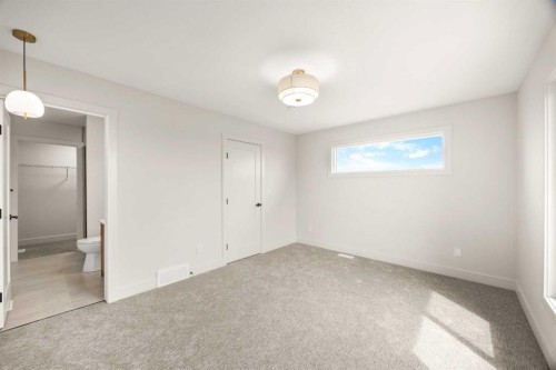 305-67 Panatella Square Nw, Calgary, AB - Indoor Photo Showing Other Room