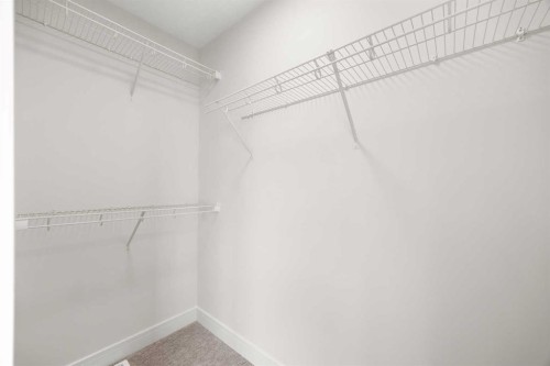 305-67 Panatella Square Nw, Calgary, AB - Indoor With Storage