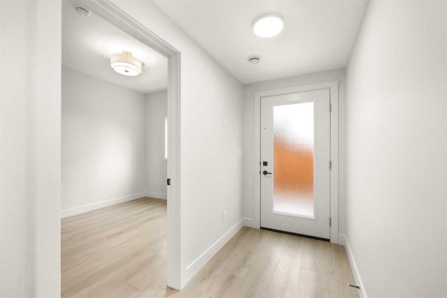 305-67 Panatella Square Nw, Calgary, AB - Indoor Photo Showing Other Room