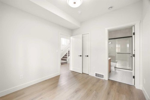 305-67 Panatella Square Nw, Calgary, AB - Indoor Photo Showing Other Room