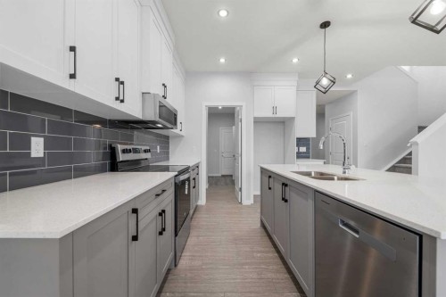 532 Clearwater Heath, Chestermere, AB - Indoor Photo Showing Kitchen With Double Sink With Upgraded Kitchen