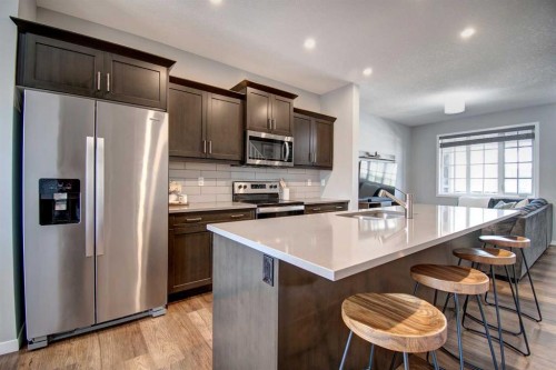 261 Ellen Way, Crossfield, AB - Indoor Photo Showing Kitchen With Upgraded Kitchen