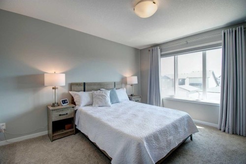 261 Ellen Way, Crossfield, AB - Indoor Photo Showing Bedroom
