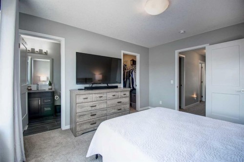 261 Ellen Way, Crossfield, AB - Indoor Photo Showing Bedroom
