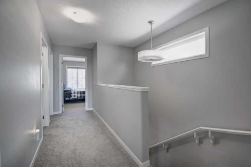 261 Ellen Way, Crossfield, AB - Indoor Photo Showing Other Room