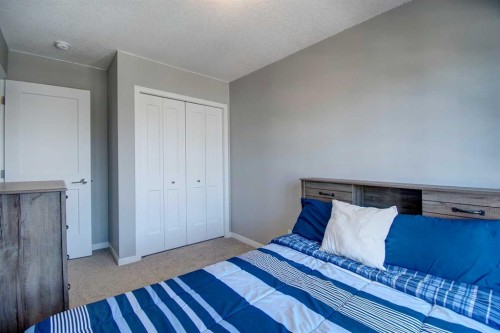 261 Ellen Way, Crossfield, AB - Indoor Photo Showing Bedroom