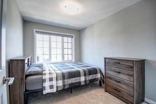 261 Ellen Way, Crossfield, AB - Indoor Photo Showing Bedroom