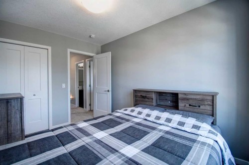 261 Ellen Way, Crossfield, AB - Indoor Photo Showing Bedroom