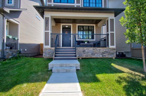 261 Ellen Way, Crossfield, AB - Outdoor With Deck Patio Veranda With Facade