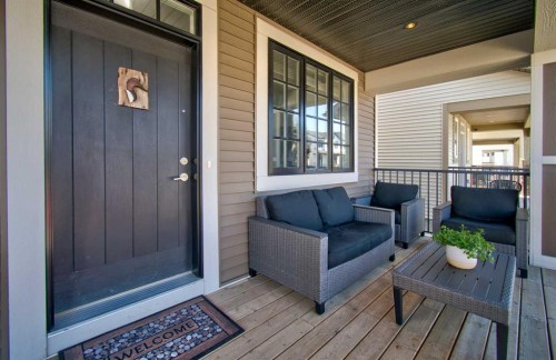 261 Ellen Way, Crossfield, AB - Outdoor With Deck Patio Veranda With Exterior