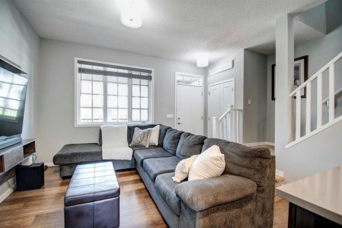 261 Ellen Way, Crossfield, AB - Indoor Photo Showing Living Room