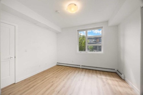 2104-55 Lucas Way Nw, Calgary, AB - Indoor Photo Showing Other Room