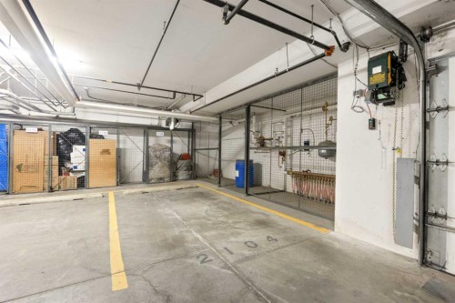 2104-55 Lucas Way Nw, Calgary, AB - Indoor Photo Showing Garage