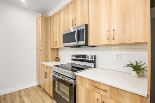 2104-55 Lucas Way Nw, Calgary, AB - Indoor Photo Showing Kitchen