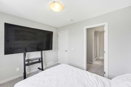 308-32 Red Embers Parade Ne, Calgary, AB - Indoor Photo Showing Bedroom