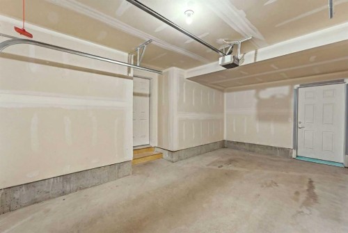 308-32 Red Embers Parade Ne, Calgary, AB - Indoor Photo Showing Garage