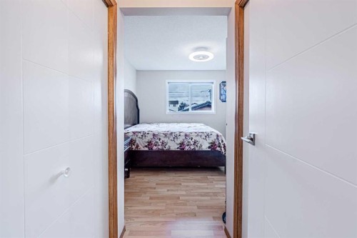 65 Martinvalley Road Ne, Calgary, AB - Indoor Photo Showing Bedroom