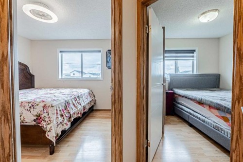 65 Martinvalley Road Ne, Calgary, AB - Indoor Photo Showing Bedroom