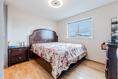 65 Martinvalley Road Ne, Calgary, AB - Indoor Photo Showing Bedroom