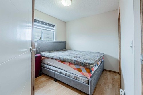 65 Martinvalley Road Ne, Calgary, AB - Indoor Photo Showing Bedroom