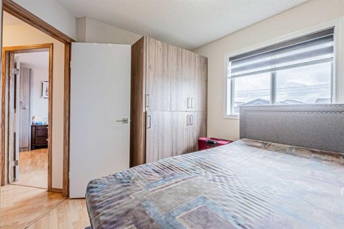 65 Martinvalley Road Ne, Calgary, AB - Indoor Photo Showing Bedroom