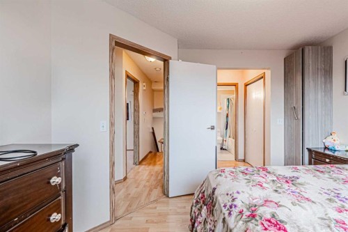 65 Martinvalley Road Ne, Calgary, AB - Indoor Photo Showing Bedroom