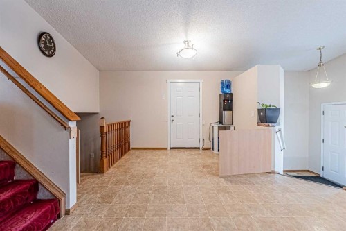 65 Martinvalley Road Ne, Calgary, AB - Indoor Photo Showing Other Room