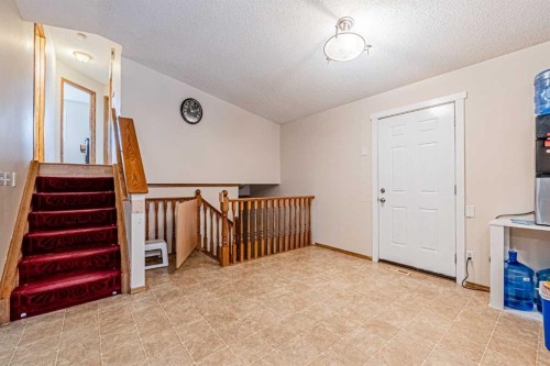 65 Martinvalley Road Ne, Calgary, AB - Indoor Photo Showing Other Room