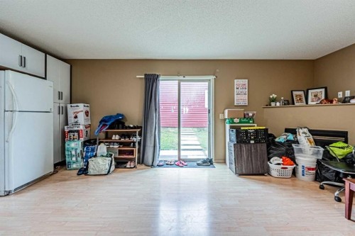 65 Martinvalley Road Ne, Calgary, AB - Indoor Photo Showing Other Room