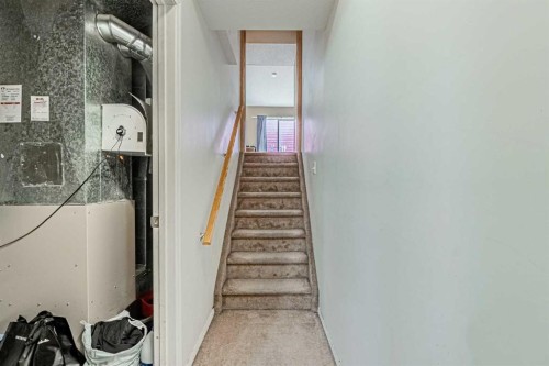 65 Martinvalley Road Ne, Calgary, AB - Indoor Photo Showing Other Room