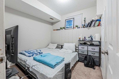 65 Martinvalley Road Ne, Calgary, AB - Indoor Photo Showing Bedroom