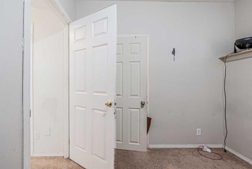65 Martinvalley Road Ne, Calgary, AB - Indoor Photo Showing Other Room