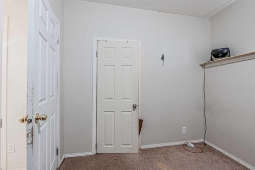 65 Martinvalley Road Ne, Calgary, AB - Indoor Photo Showing Other Room