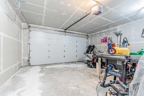 65 Martinvalley Road Ne, Calgary, AB - Indoor Photo Showing Garage