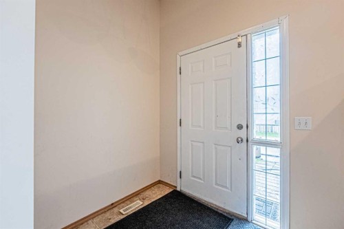 65 Martinvalley Road Ne, Calgary, AB - Indoor Photo Showing Other Room